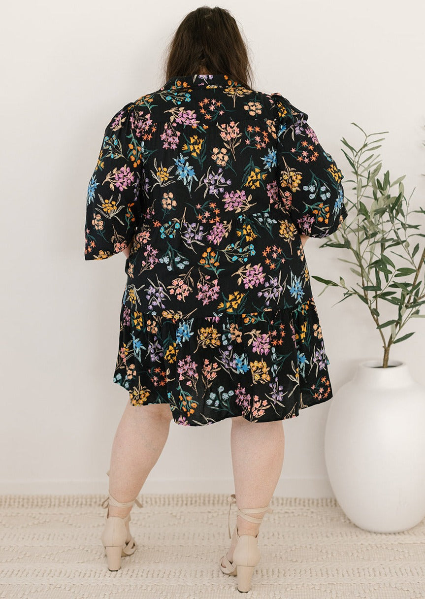 plus-size knee-length button-down black and floral dress with pockets and long sleeves