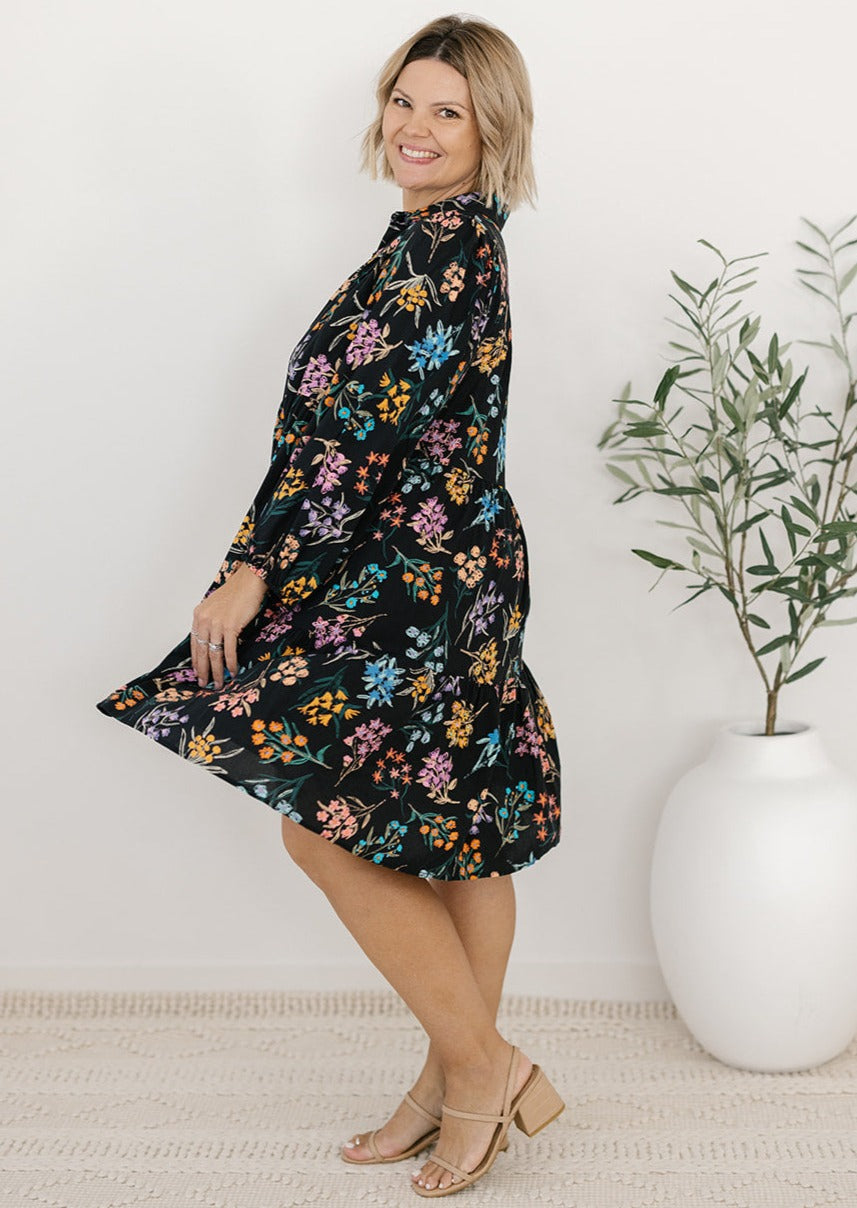 plus-size knee-length button-down black and floral dress with pockets and long sleeves