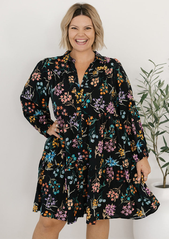 plus-size knee-length button-down black and floral dress with pockets and long sleeves