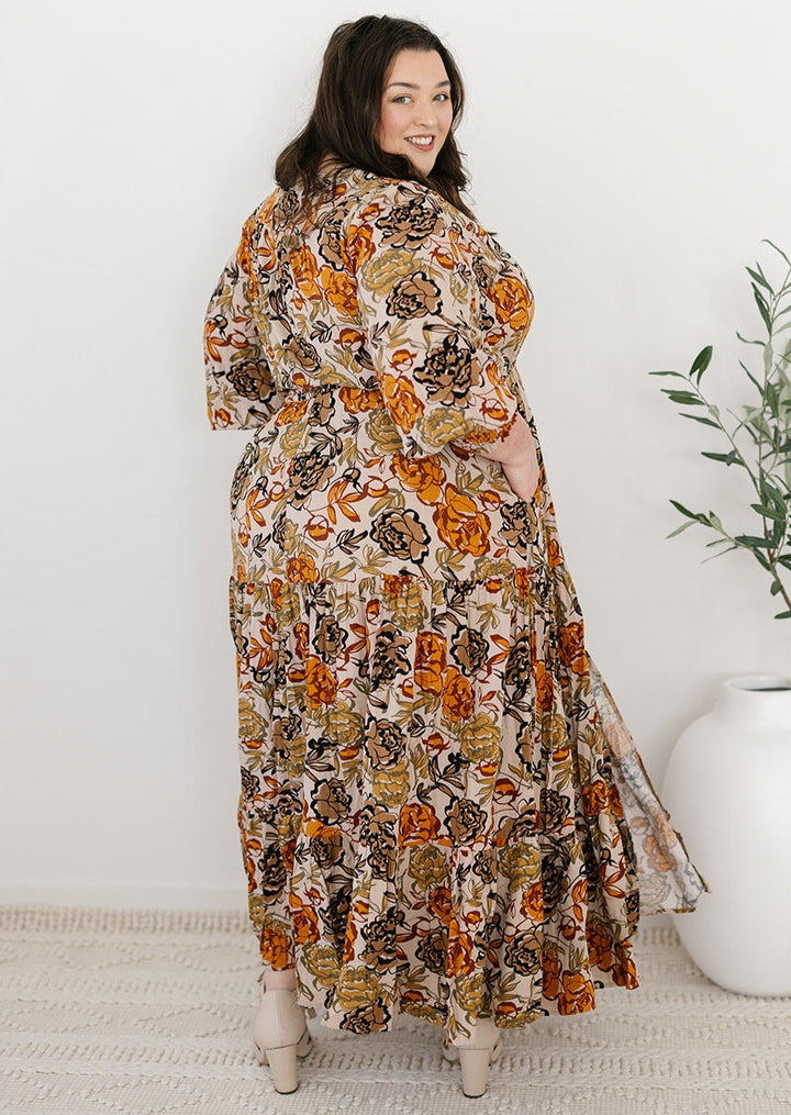 plus-size neutral floral maxi dress with drawstring waist, pockets and long sleeves