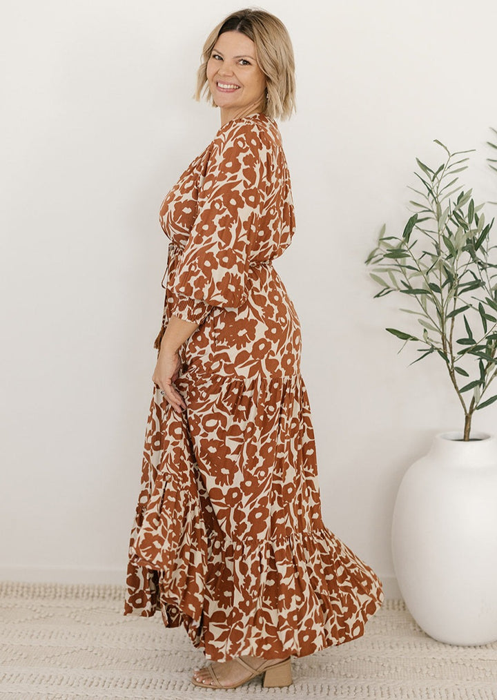 Long-sleeved brown floral maxi dress