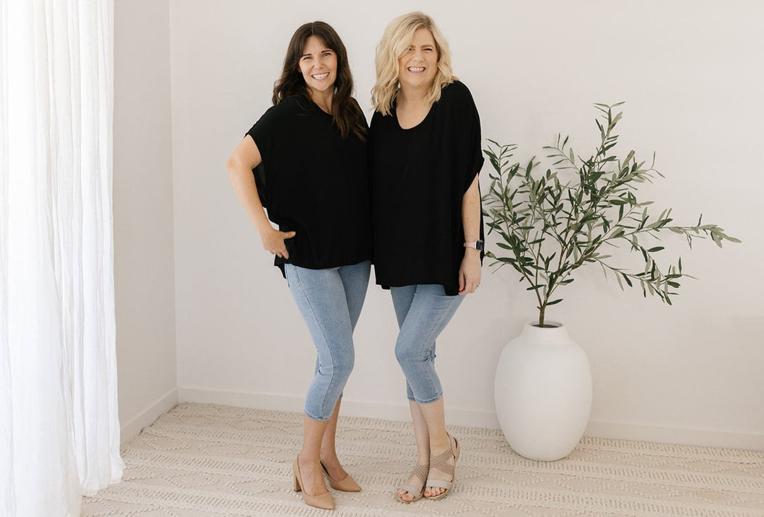 Women’s flowy black plus-size blouse