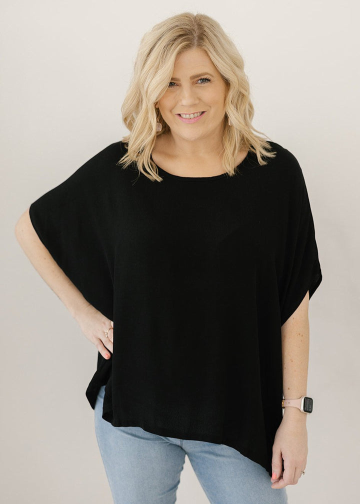 Women’s flowy black plus-size blouse