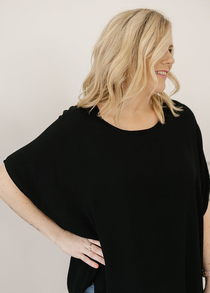 Women’s flowy black plus-size blouse