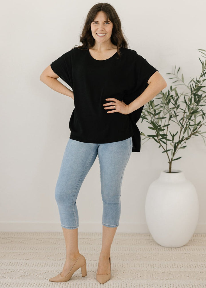 Women’s flowy black plus-size blouse