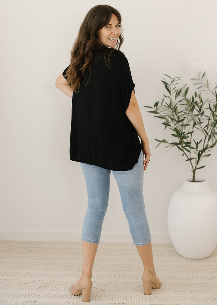 Women’s flowy black plus-size blouse