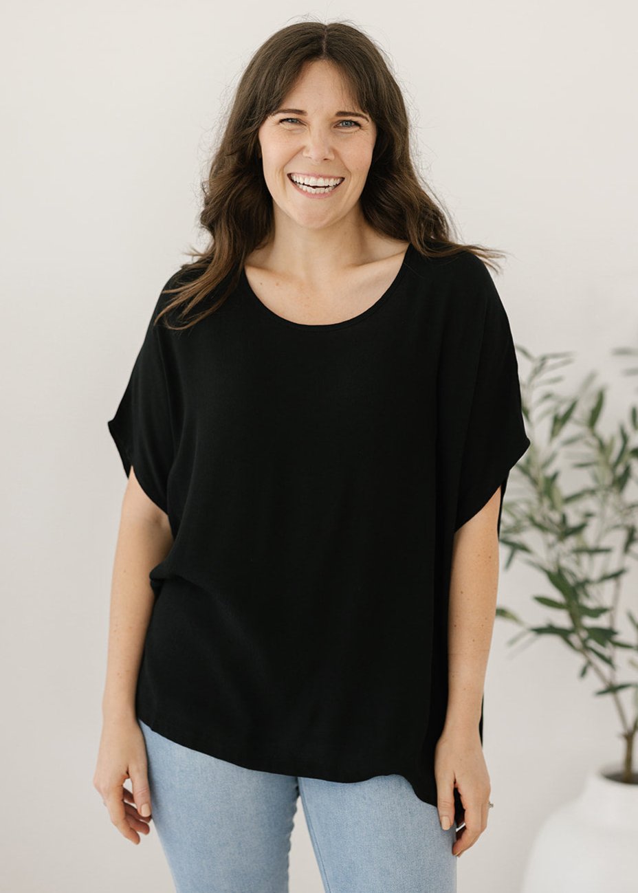 Women’s flowy black plus-size blouse