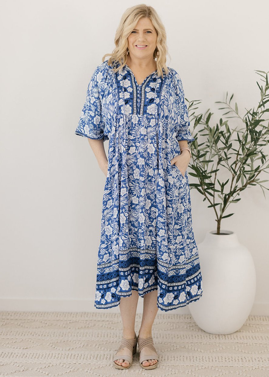 bump-friendly blue and white floral smock-style dress with pockets