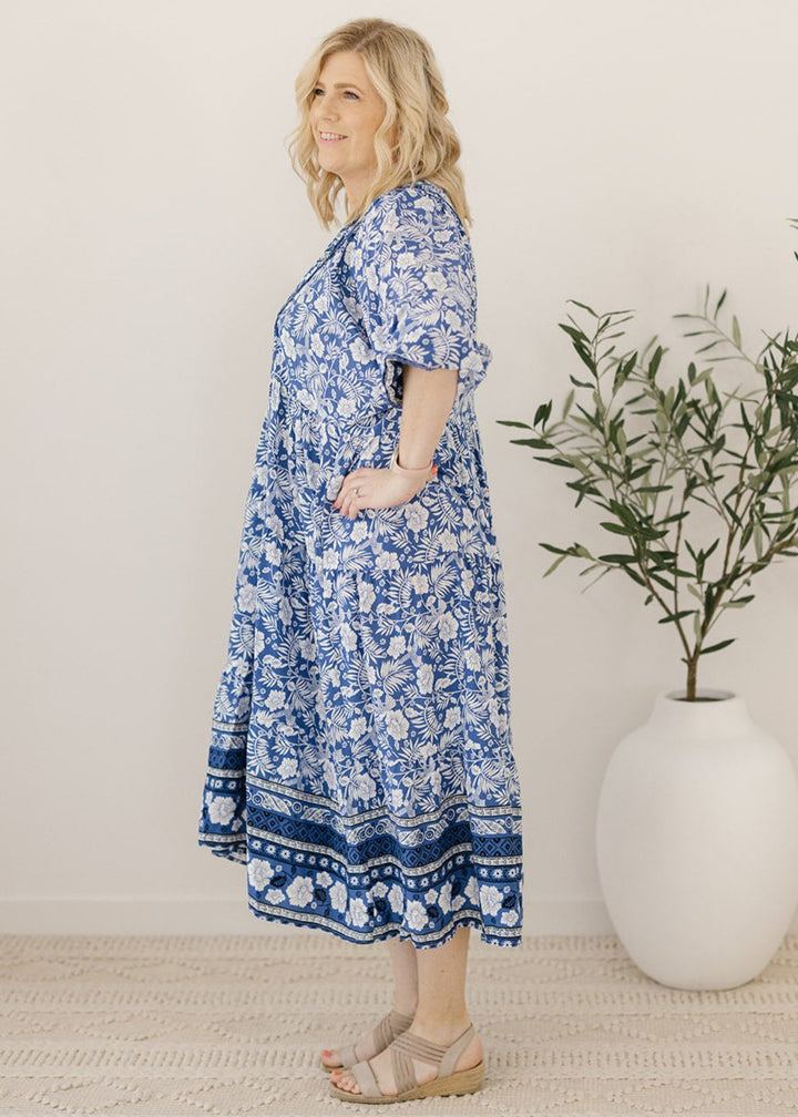 plus-size blue and white floral-print maxi dress with pockets