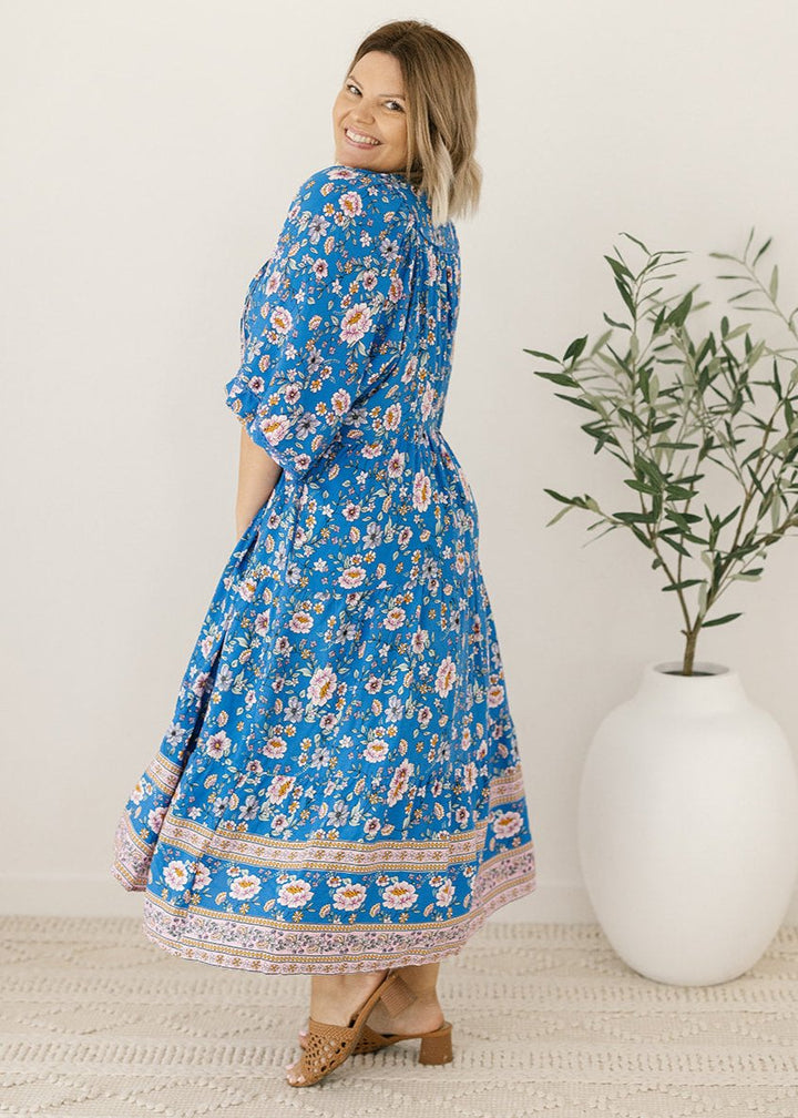 plus-size blue floral-print maxi dress with pockets