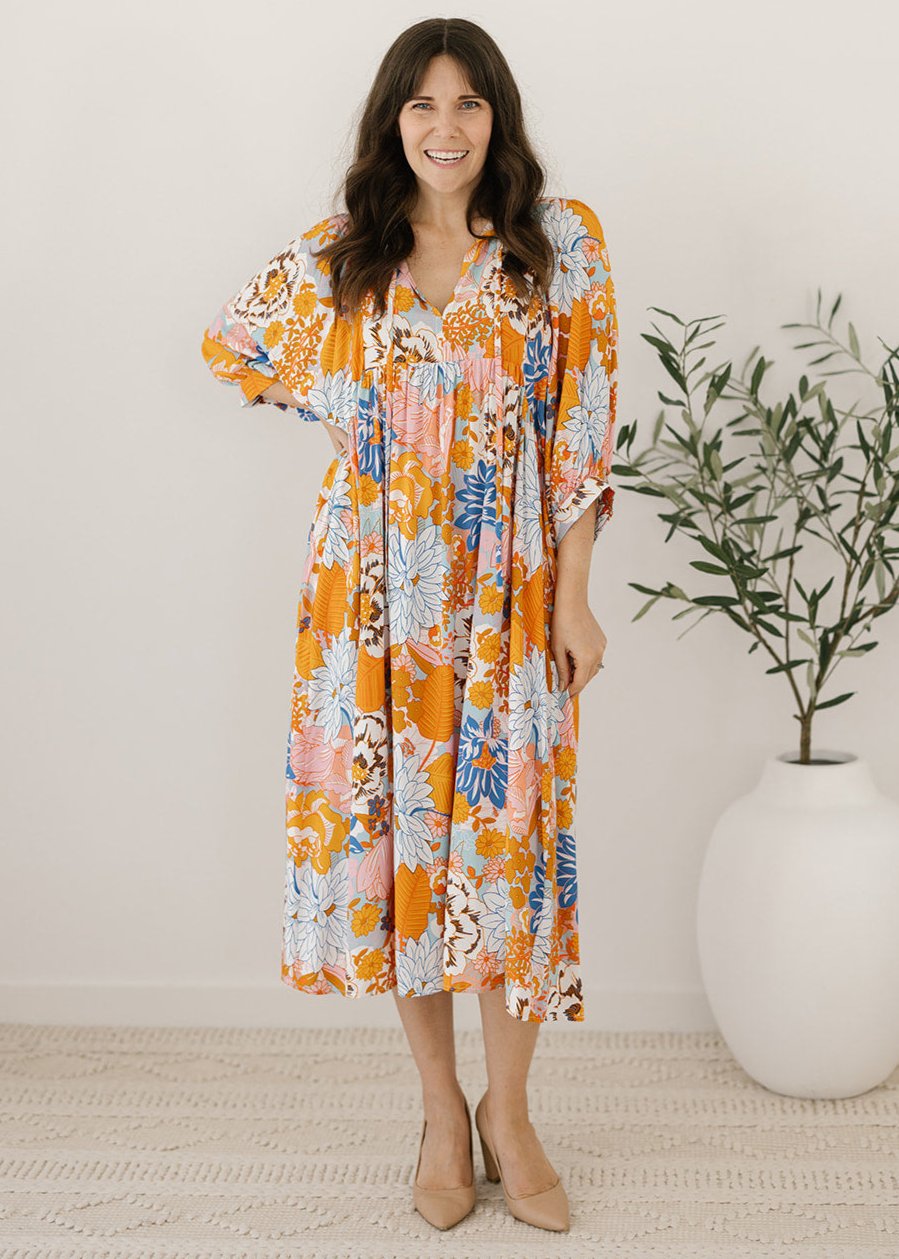 bump-friendly orange and blue floral smock-style dress 