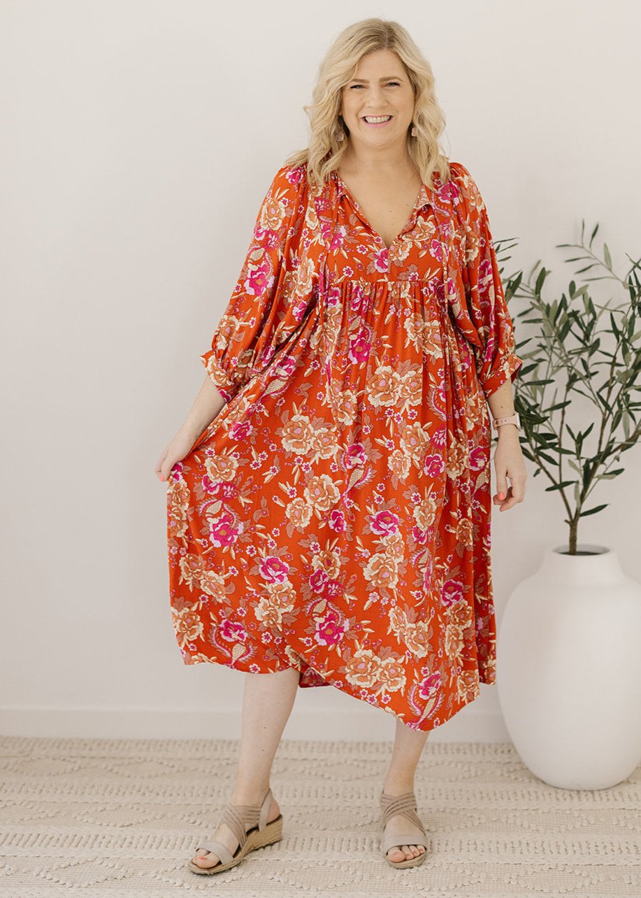 bump-friendly rust and pink floral smock-style dress 