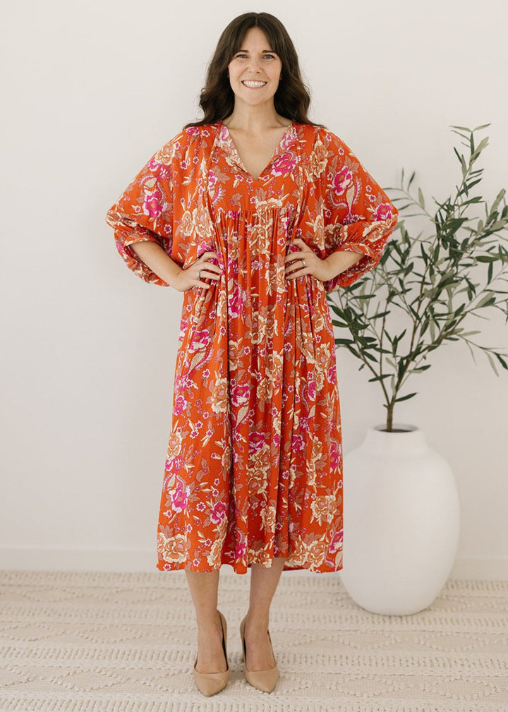 rust and pink floral smock-style maxi dress