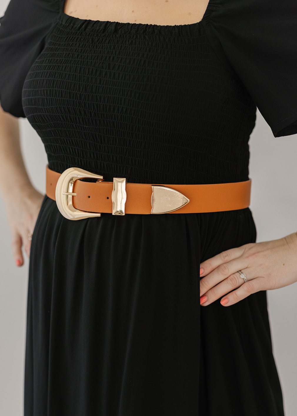 tan western-style faux-leather belt